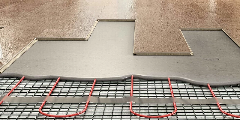 Le sol stratifié et le plancher chauffant